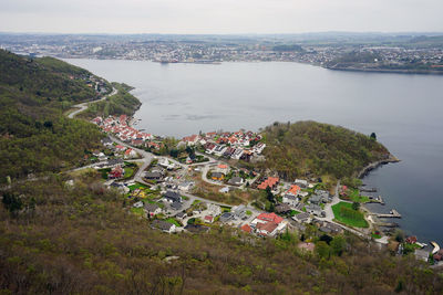 High angle view of townscape by sea