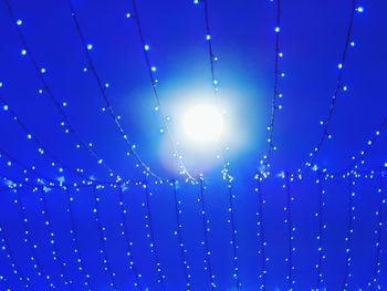 Close-up of illuminated blue lights at night