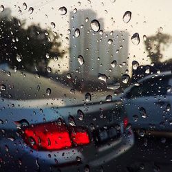 Raindrops on windshield of car window
