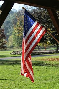 Close-up of flag against sky