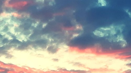 Low angle view of clouds in sky during sunset