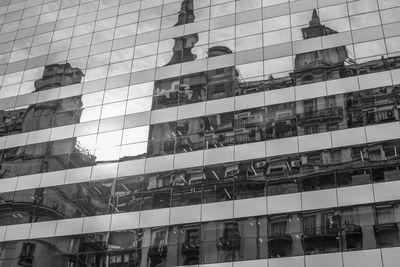 Low angle view of modern buildings against sky