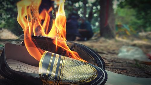 Close-up of fire against blurred background