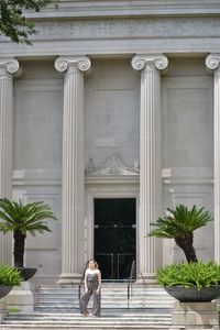 Rear view of man outside building