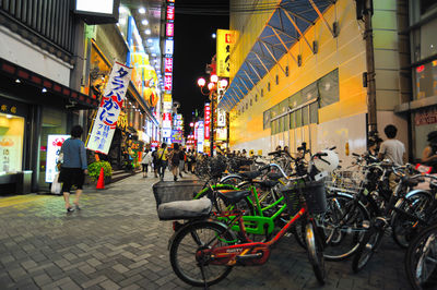 Bicycles on street in city at night