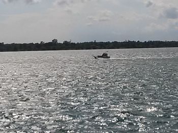 Boat sailing in sea