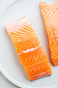 Fresh salmon fillet on a plate for delicious salmon steak.