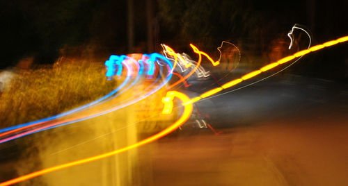 Light trails on road at night