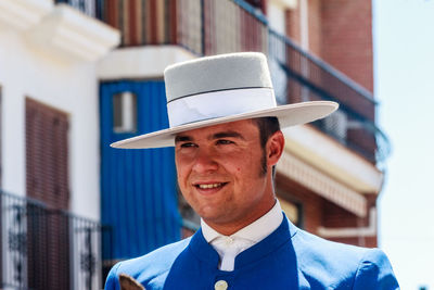 Portrait of man wearing hat