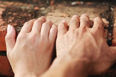 Cropped hands on table