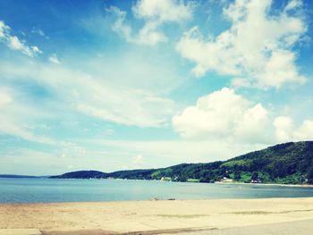 Scenic view of sea against cloudy sky