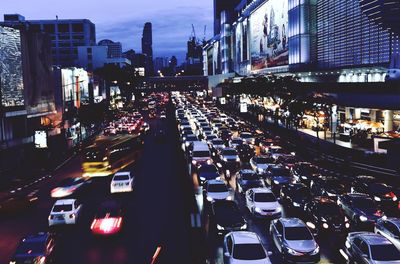 High angle view of traffic on city street at night