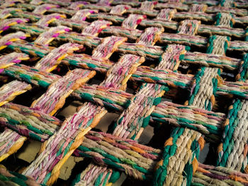 Full frame shot of crisscross pattern on camp bed