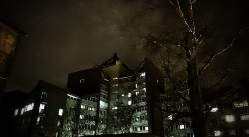 Low angle view of building against sky at night