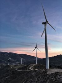 Wind turbines on field