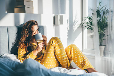 Young woman using mobile phone