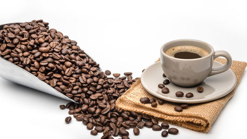 Close-up of coffee cup on table