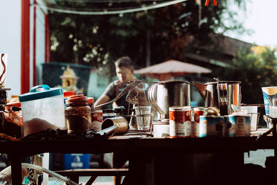 Containers on table at market stall