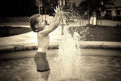 Girl playing in swimming pool