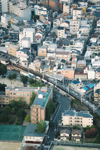 High angle view of street amidst buildings in city