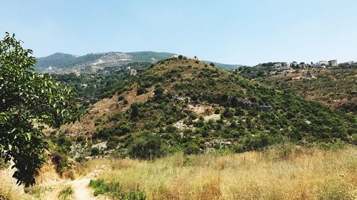 Scenic view of mountains against clear sky