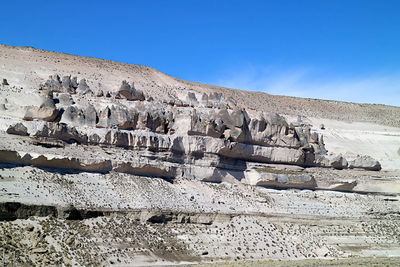 Incredible rock formations against blue sky along the mountainoad in arequipa region, peru