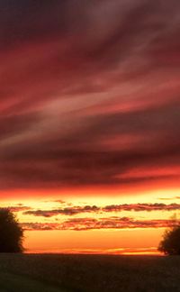 Scenic view of dramatic sky during sunset