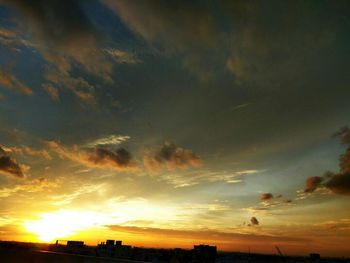 Scenic view of dramatic sky during sunset