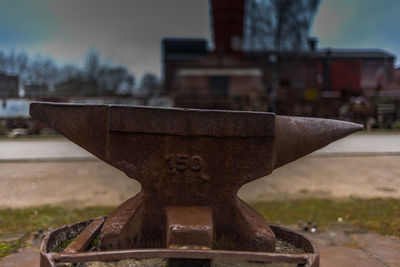 Close-up of metal sculpture in cemetery