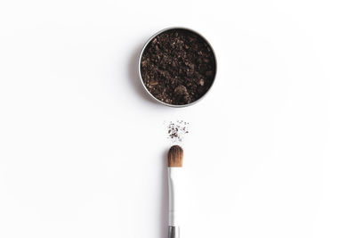High angle view of coffee on white background