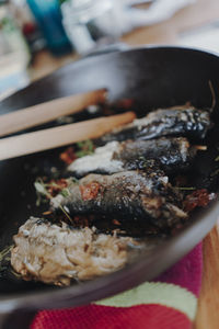 Close-up of fish on barbecue grill