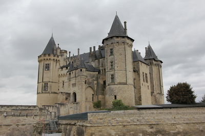 Low angle view of historic building against sky