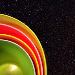 Close-up of light bulb over black background