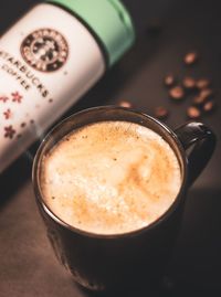 High angle view of cappuccino on table