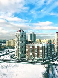 Cityscape against sky during winter