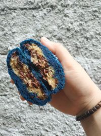 Close-up of hand holding cookies