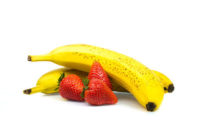 Close-up of fruits against white background