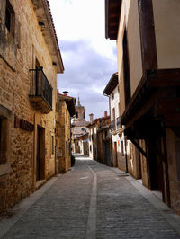 Narrow alley along buildings