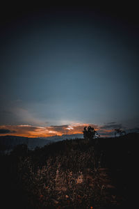 Scenic view of silhouette landscape against sky during sunset