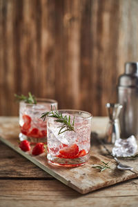 Close-up of drinks on wooden table