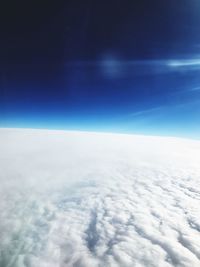 Aerial view of clouds over blue sky