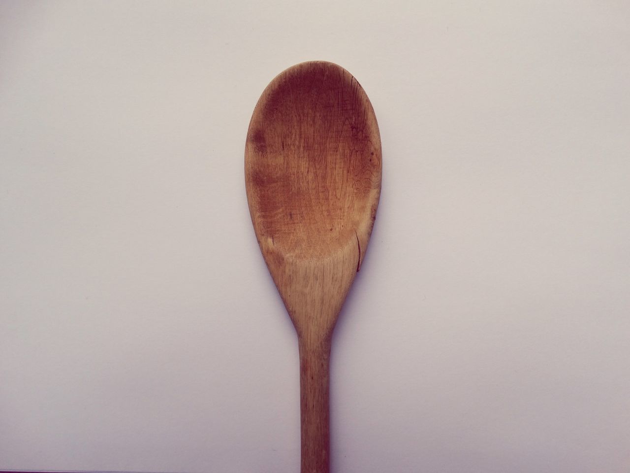 CLOSE-UP OF BREAD ON WHITE BACKGROUND