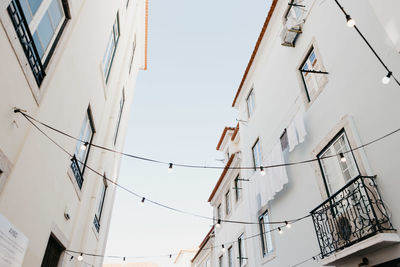 Low angle view of buildings against clear sky