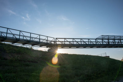 Bridge against sky on sunny day