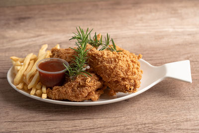 Close-up of food in plate on table