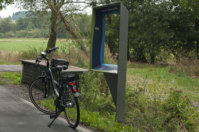 Bicycle parked on field