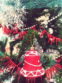 Close-up of christmas decorations hanging on tree