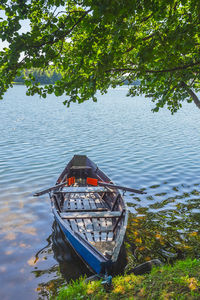 High angle view of boat moored on lake