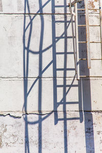 Close-up of shadow on brick wall