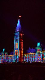 Illuminated tower at night